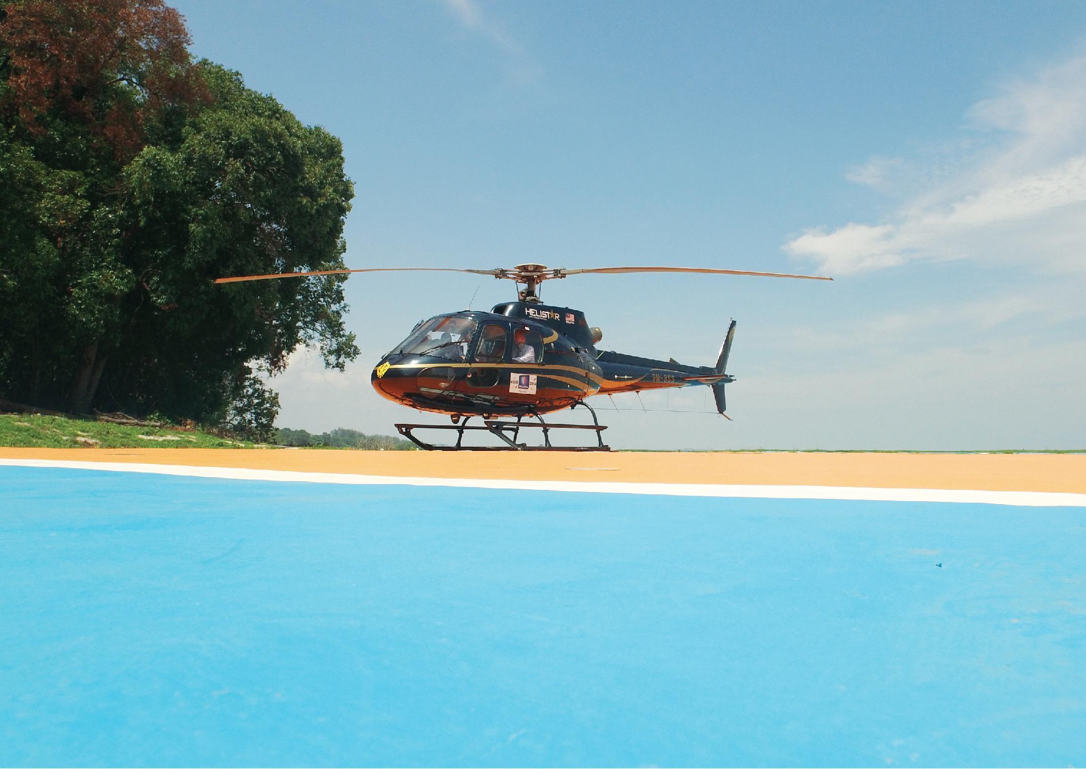 马来西亚大红花（丽昇精选酒店） 波德申 外观 照片 A private helicopter landing at the airport